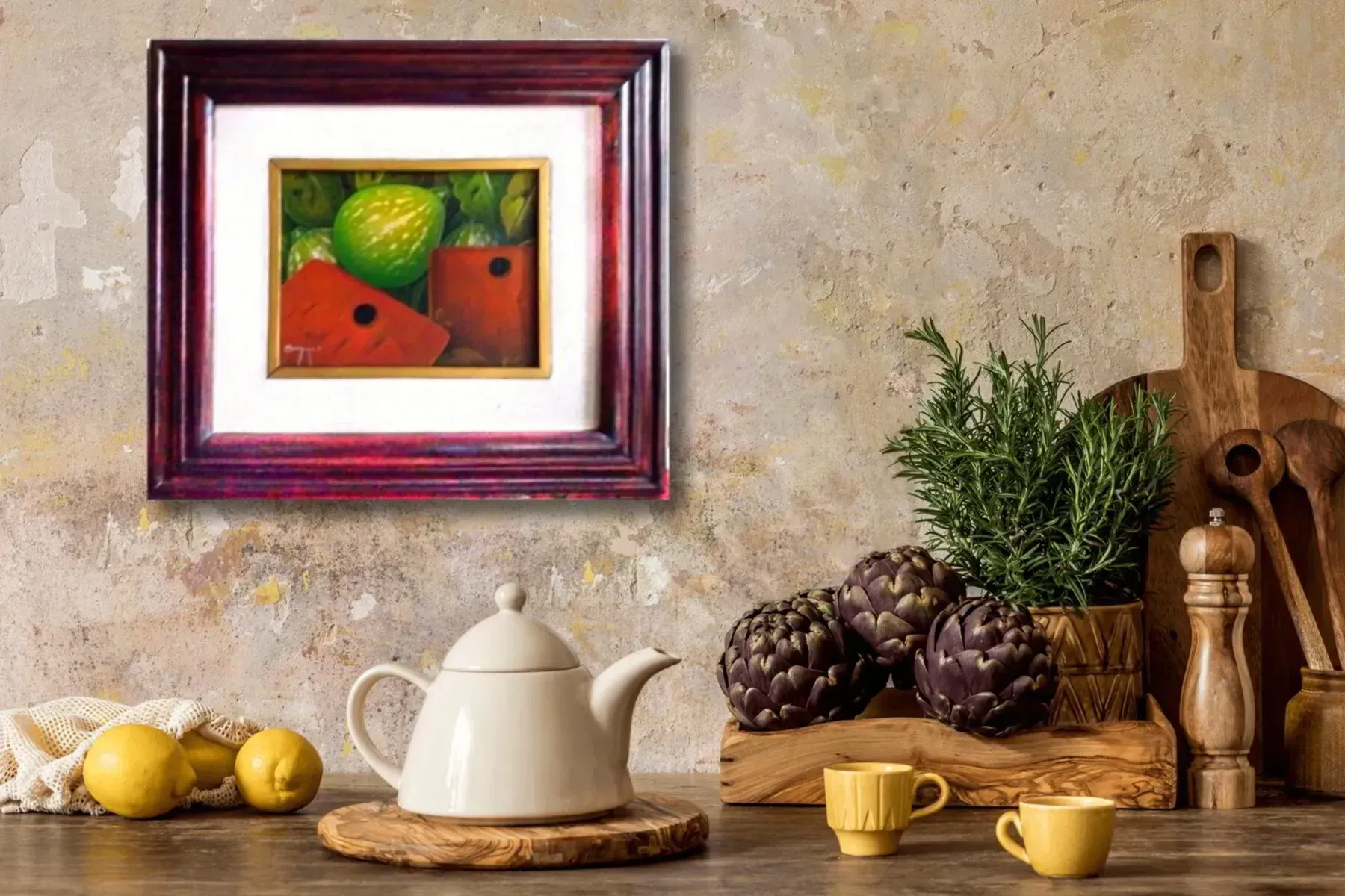 Still life: framed painting of watermelon and citrus, kitchen counter with artichokes, teapot, lemons.