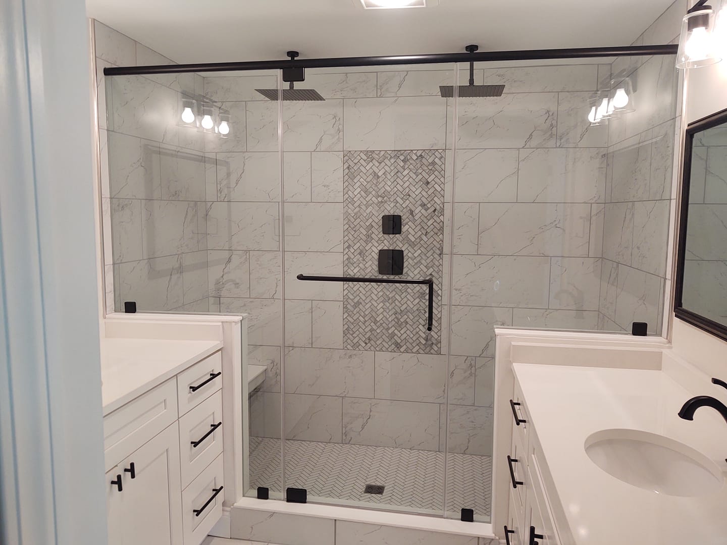 Glass Shower Door and Tiled Surfaces in Buffalo, NY Bathroom