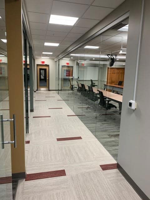 Glass Meeting Room and Tile Flooring Surface