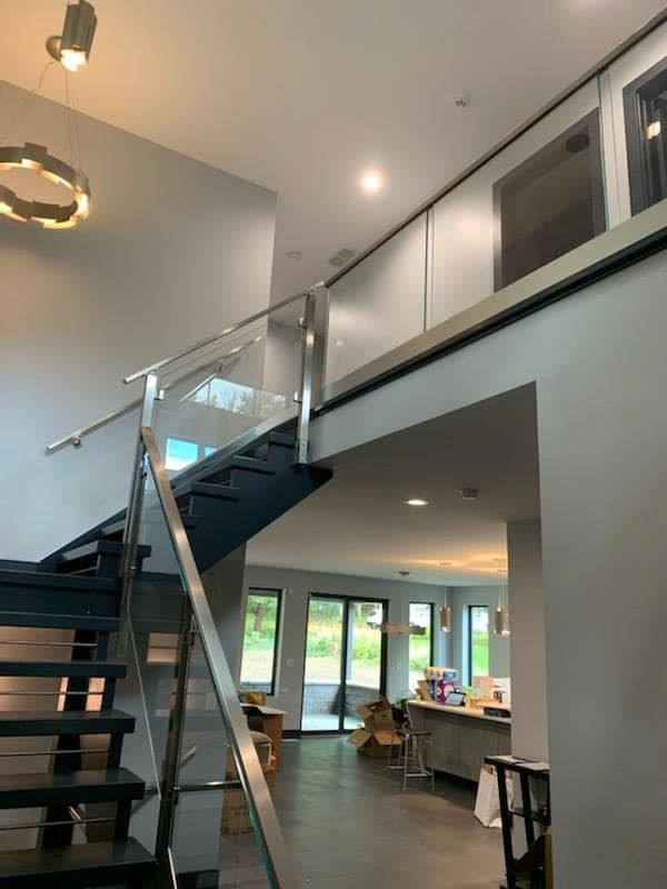 Commercial Glass Panels Bordering Metal Stairway