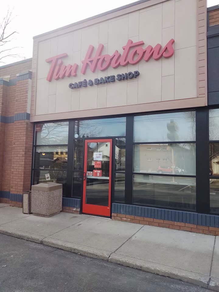 Commercial Storefront Windows & Glass Doors in Front of Tim Hortons