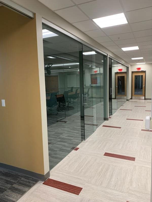 Glass Meeting Room and Tile Flooring Surface