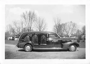 Earlier version of Hearse with 3 pointed windows in black and white photo