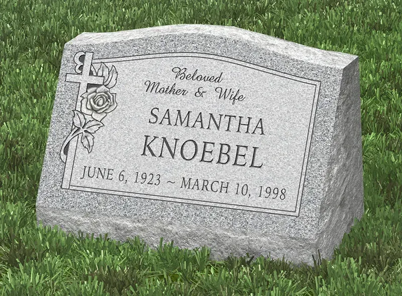 Slant grave monument with personalized engravings offered by Mynatt Funeral Home, Inc.