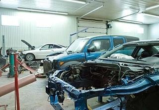 two car repairing frame – auto frame repair in Huntley, IL