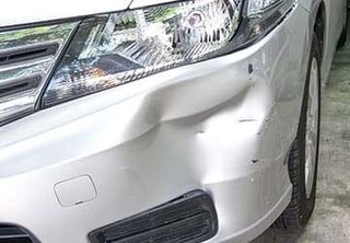 silver car dent – paintless dent repair in Huntley, IL