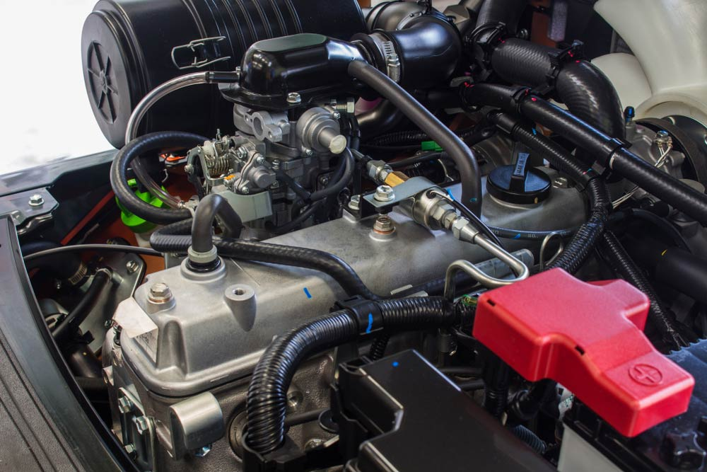 Close-up of a Car Engine With Black Hoses — Forklift Repairs & Spares In Svensson Heights, QLD