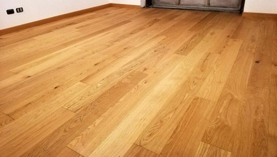 pavimento effetto legno con posa a tolda di nave