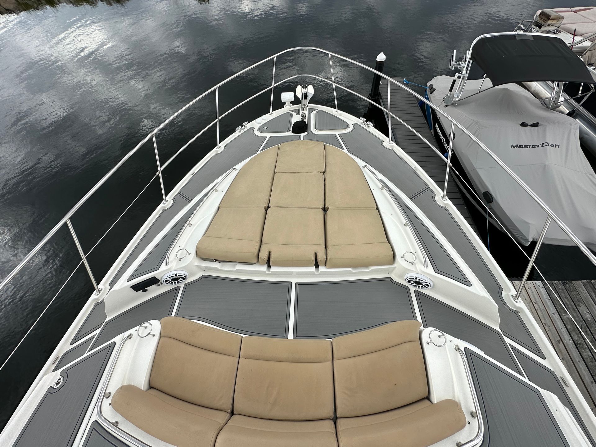 The front of a boat with a couch on it