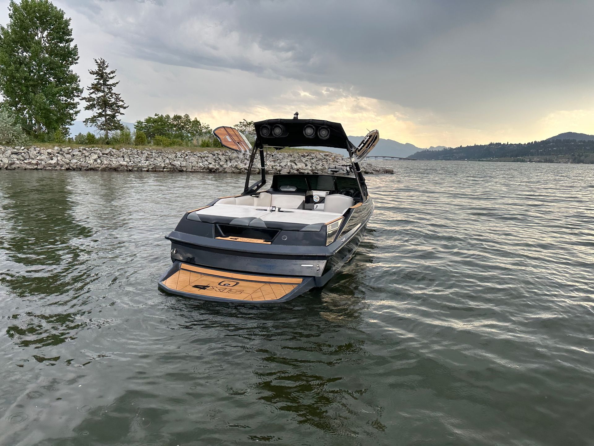 A boat is floating on top of a body of water.