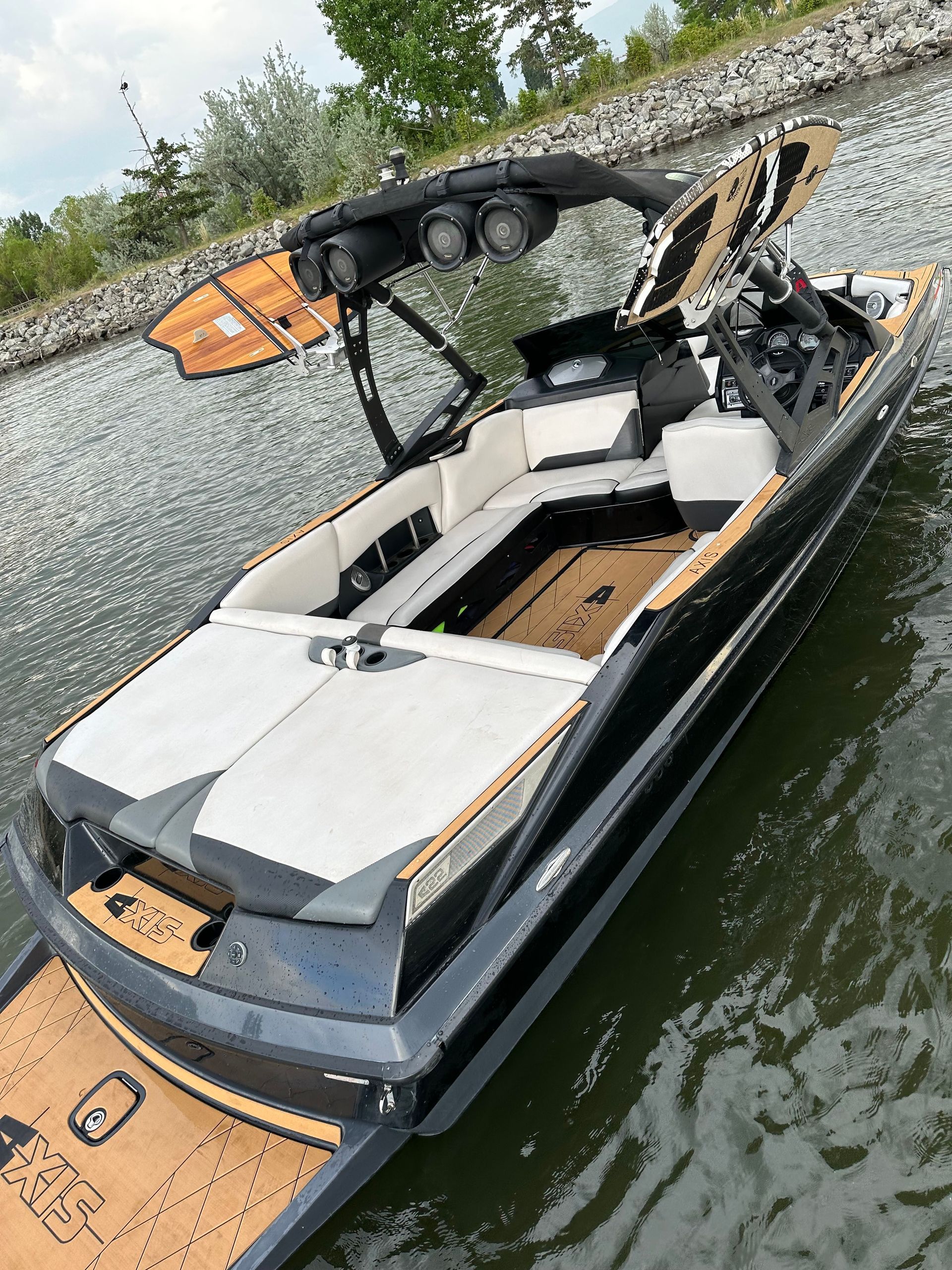 A boat is floating on top of a body of water.