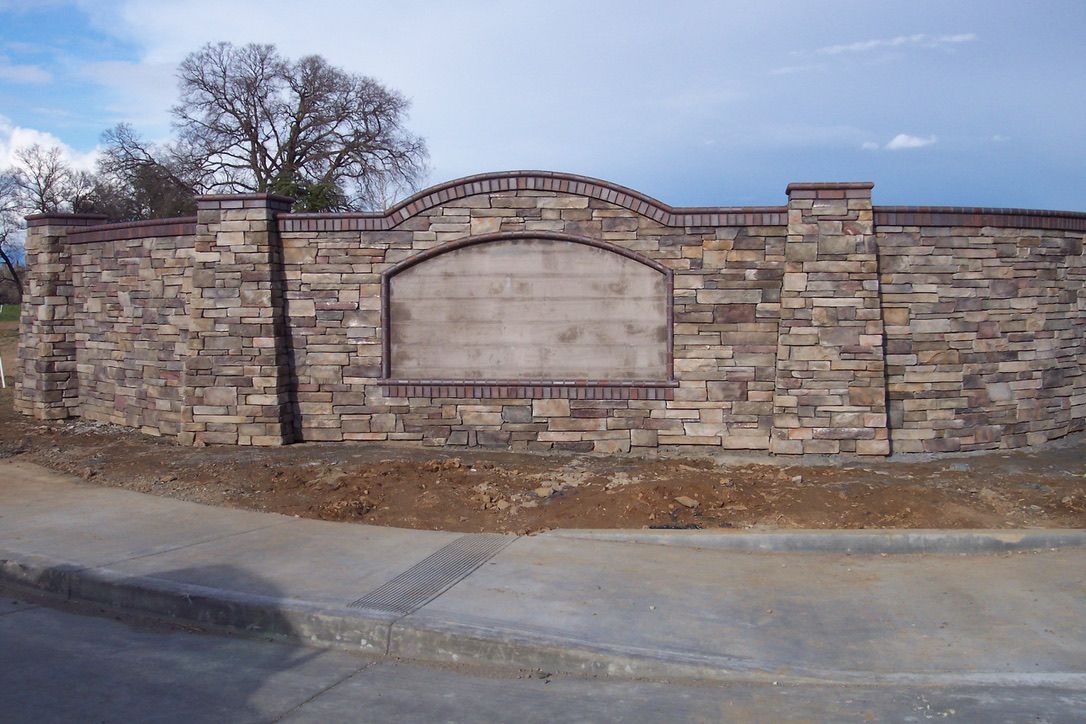 A house with a brick walkway leading to it