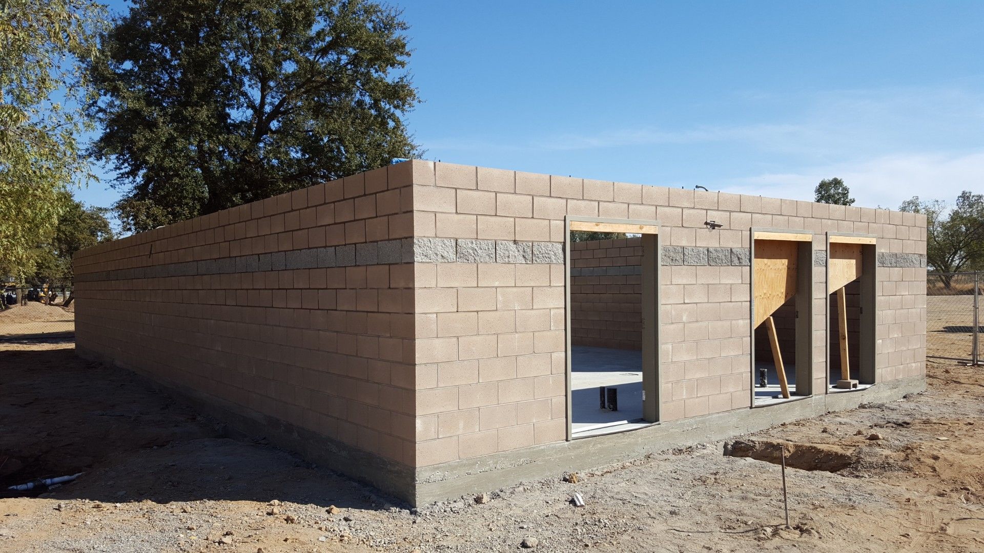 A house with a brick walkway leading to it