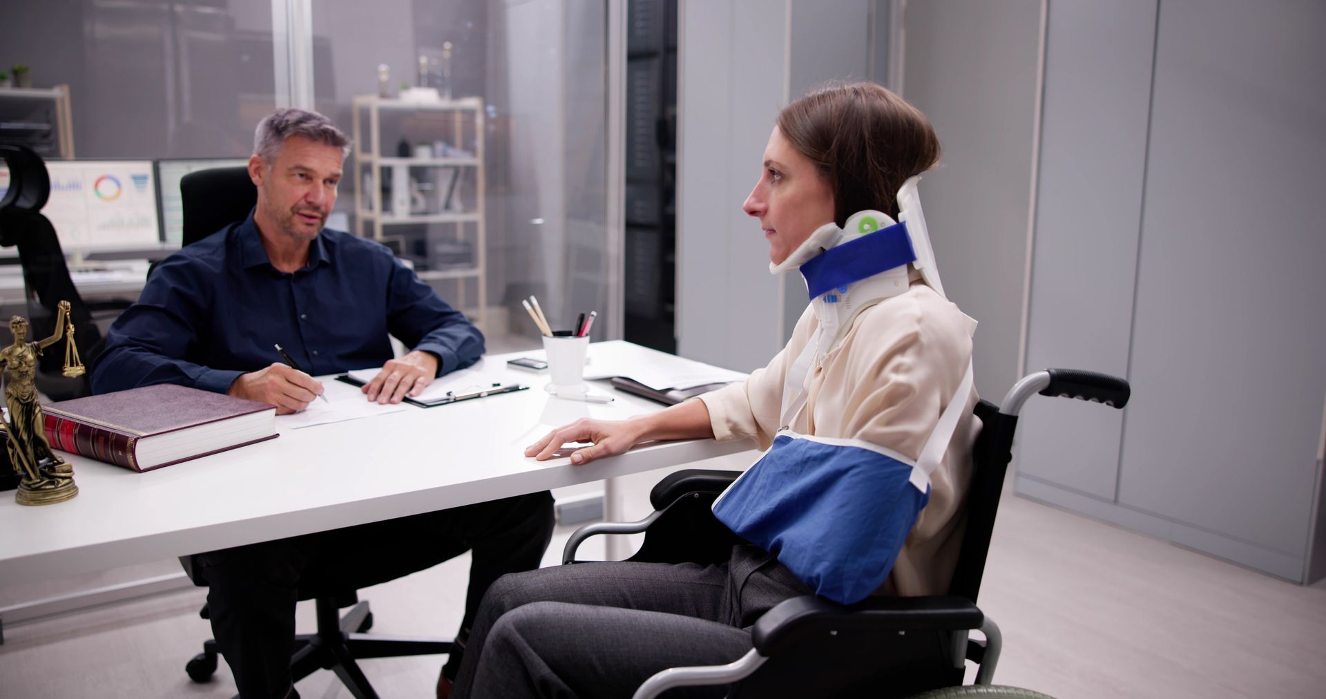 Social security lawyer helping a customer with a claim. Social security lawyer helping a customer with a claim.