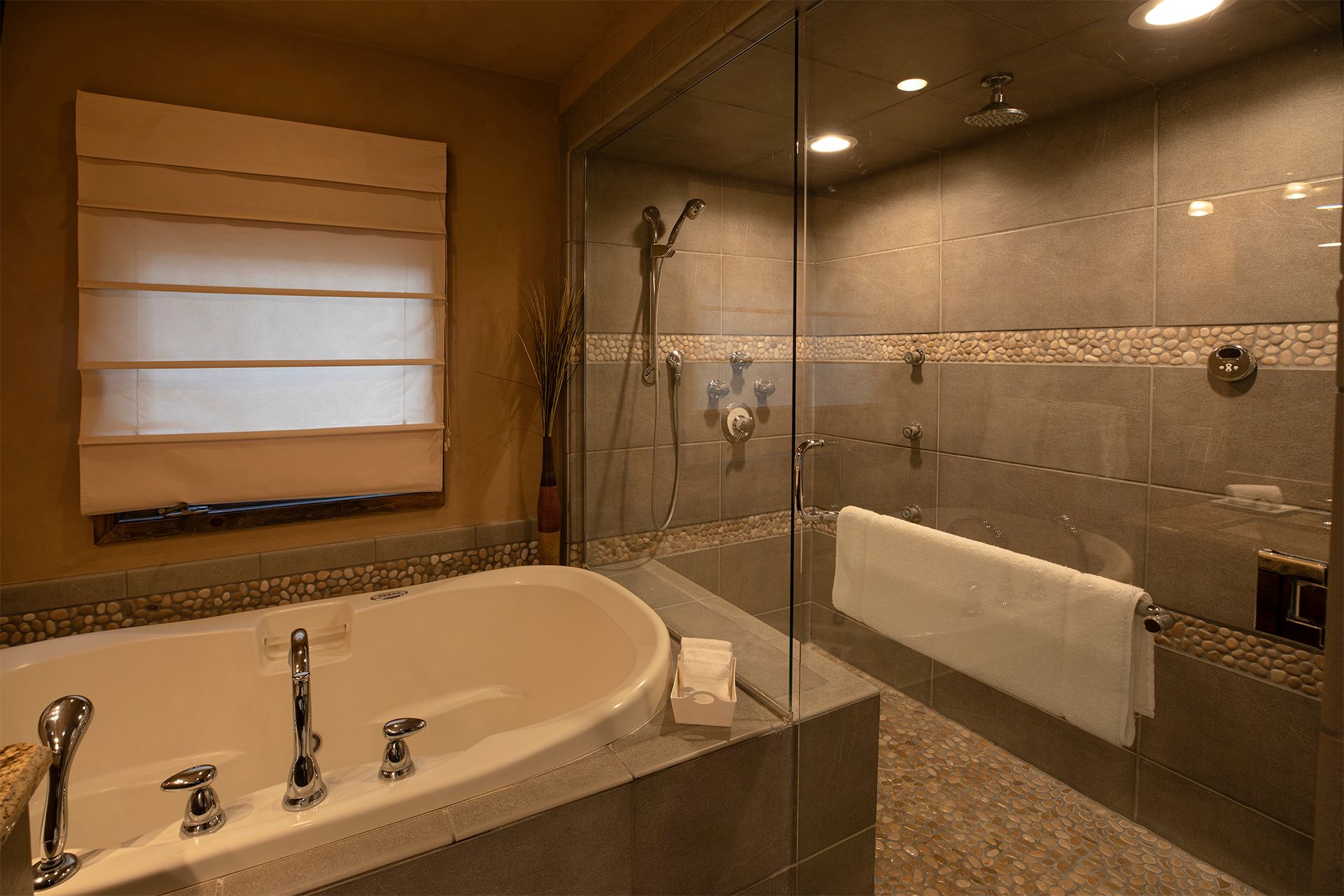 casita bathroom with large shower and tub