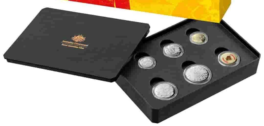 A Black Box Filled With Coins And A Yellow Box — John Platts Stamps & Coins In Mackay, QLD