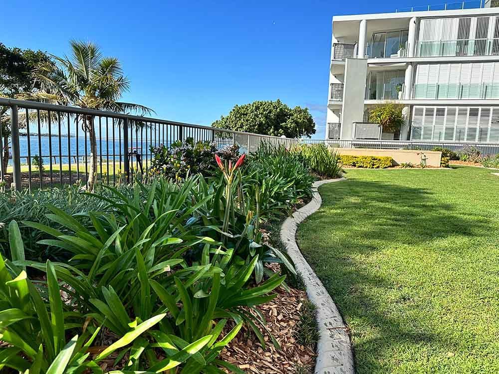 Front Building Garden Landscape — Hallsmark Property Services