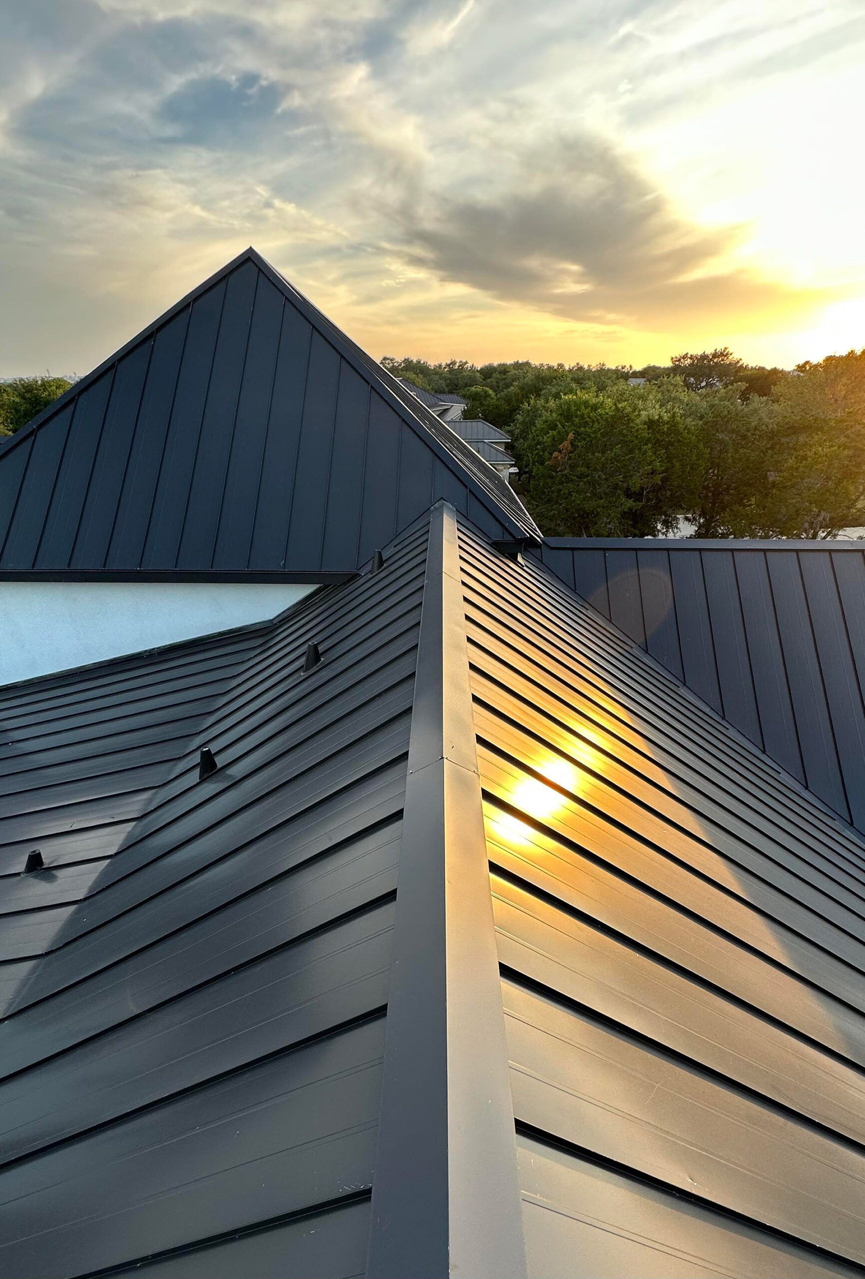 The sun is shining through the roof of a building