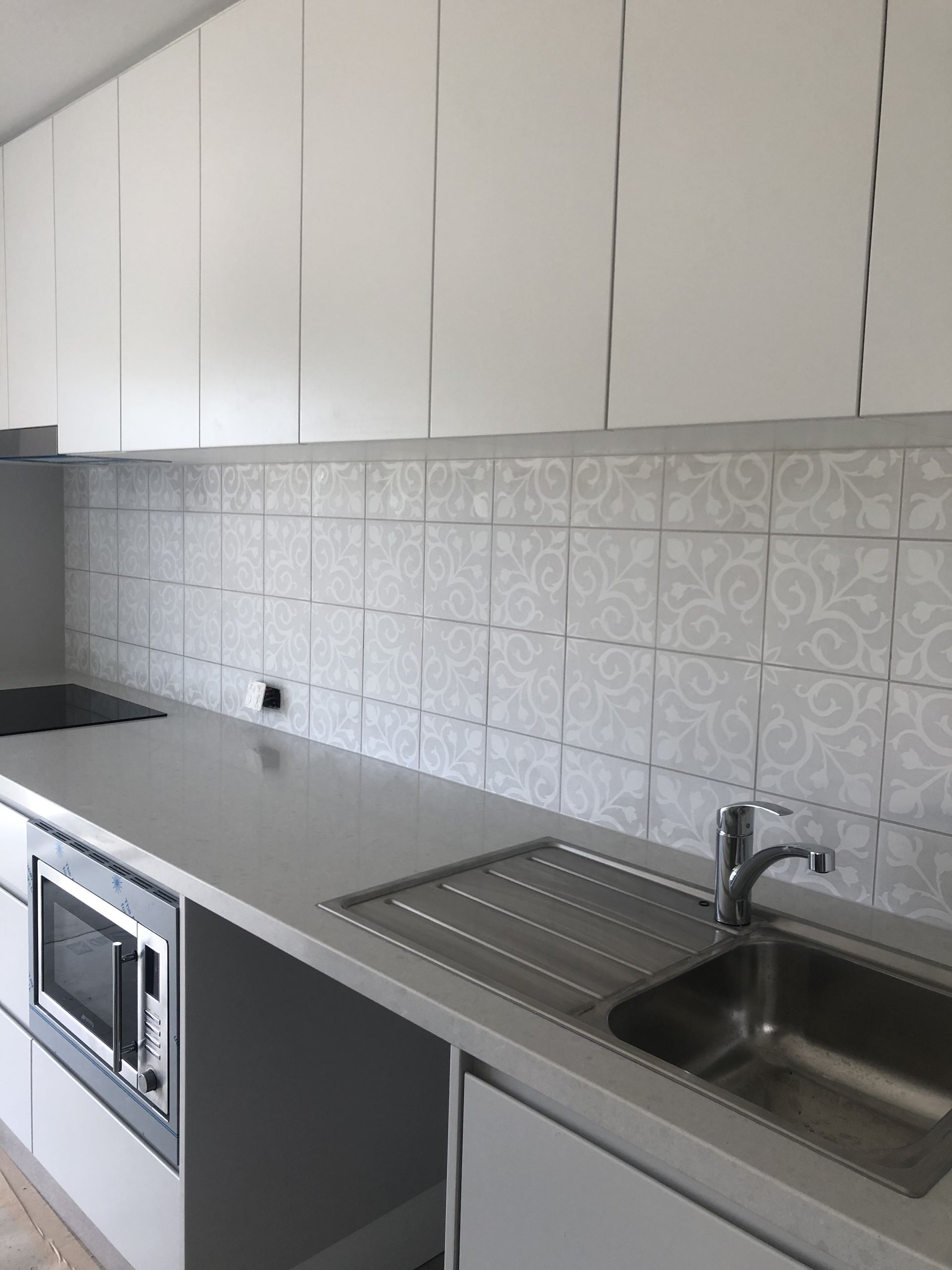 Modern Kitchen with Dark Gray Cabinets, Green Tile Backsplash — Midcoast Wall & Floor Tiling in Woolgoolga, NSW
