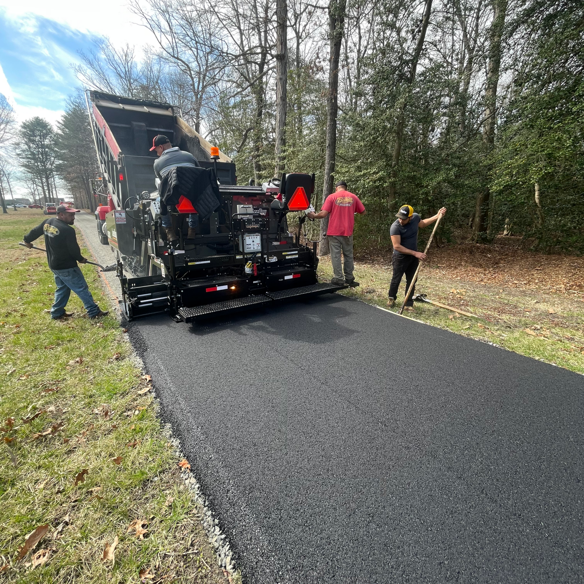 Worker Repair Sidewalk — Middletown, DE — Baker & Sons Paving