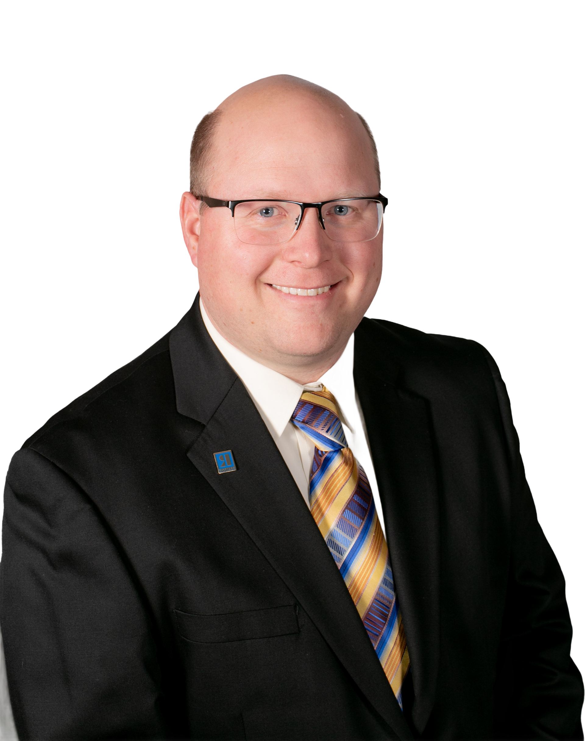 Professional headshot of a man wearing glasses