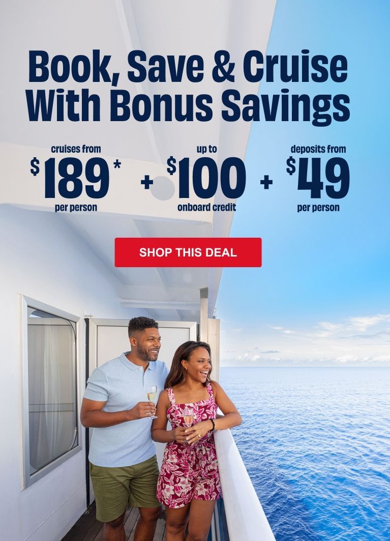 Three riders on horseback carrying American flags in an arena, illuminated by spotlights with birds flying overhead.