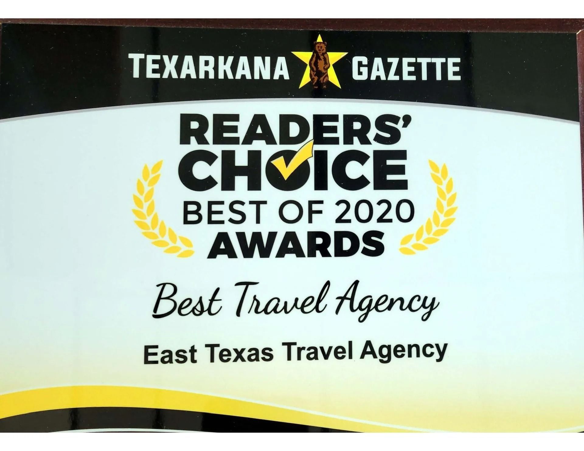 Award plaque: Texarkana Gazette Readers' Choice, Best of 2020. Best Travel Agency, East Texas Travel Agency.