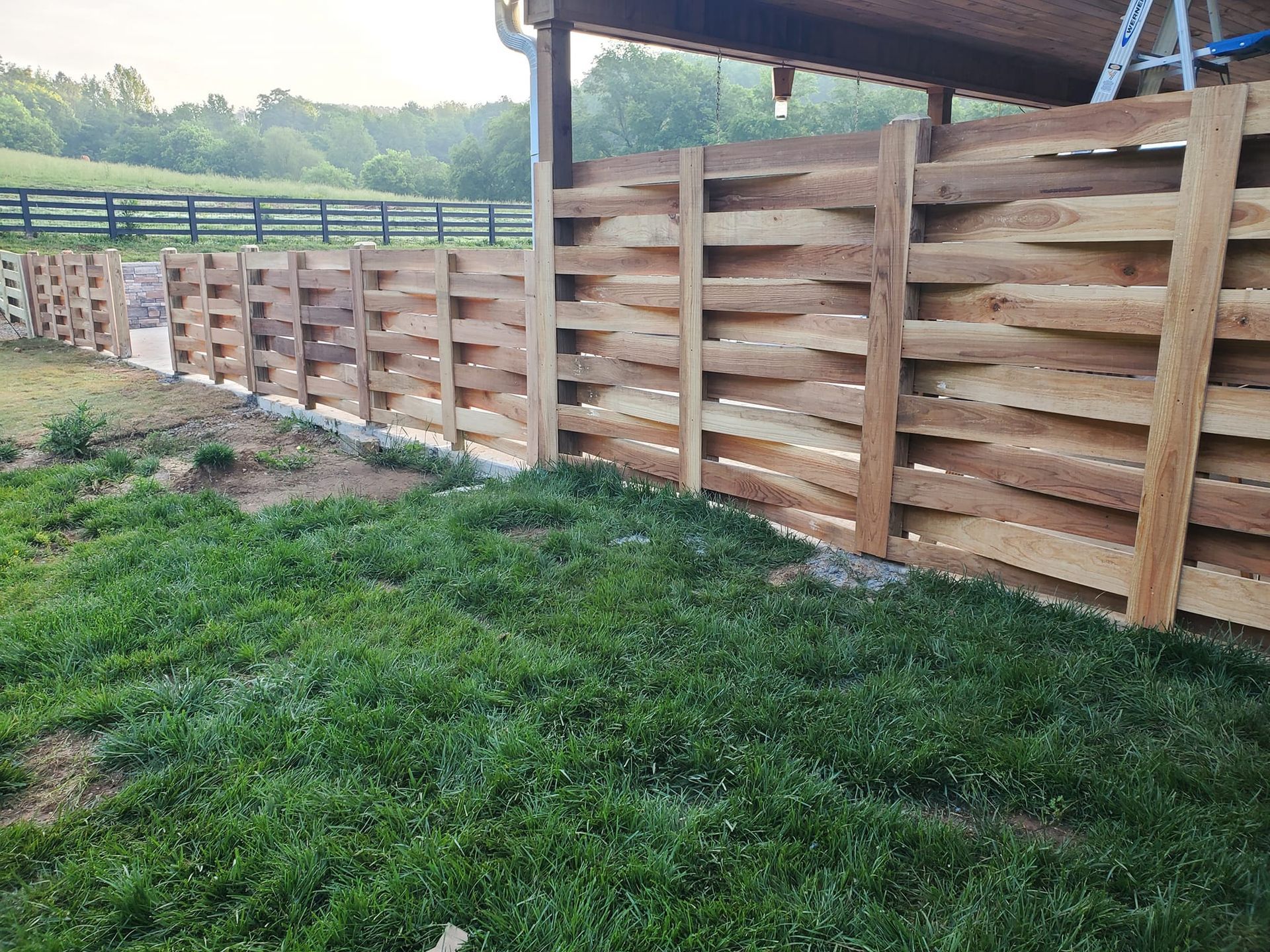 Residential Privacy Fence with stone wall