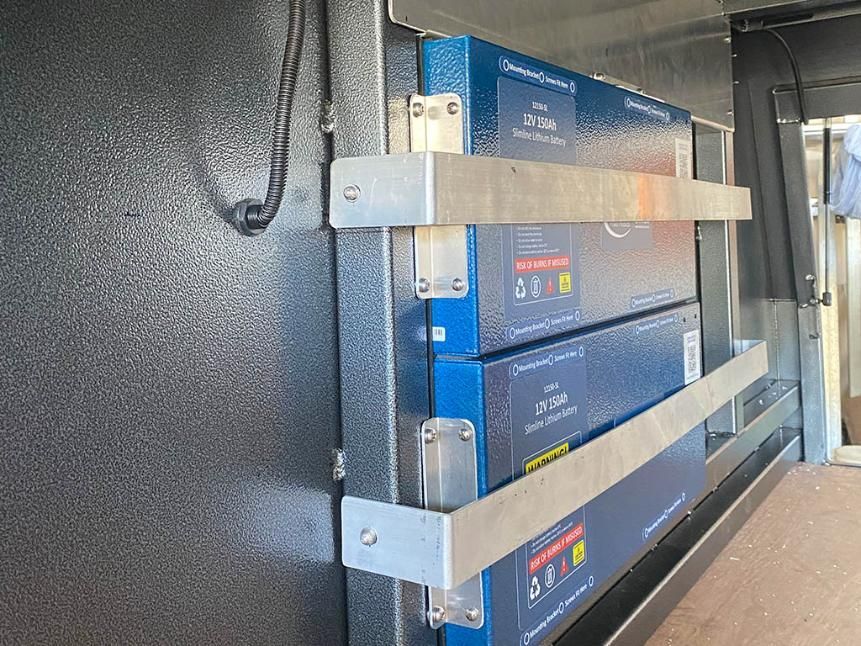 A Row Of Boxes Are Stacked On Top Of Each Other On A Wall — Quality Fabrications & Welding Pty Ltd In Bohle, QLD