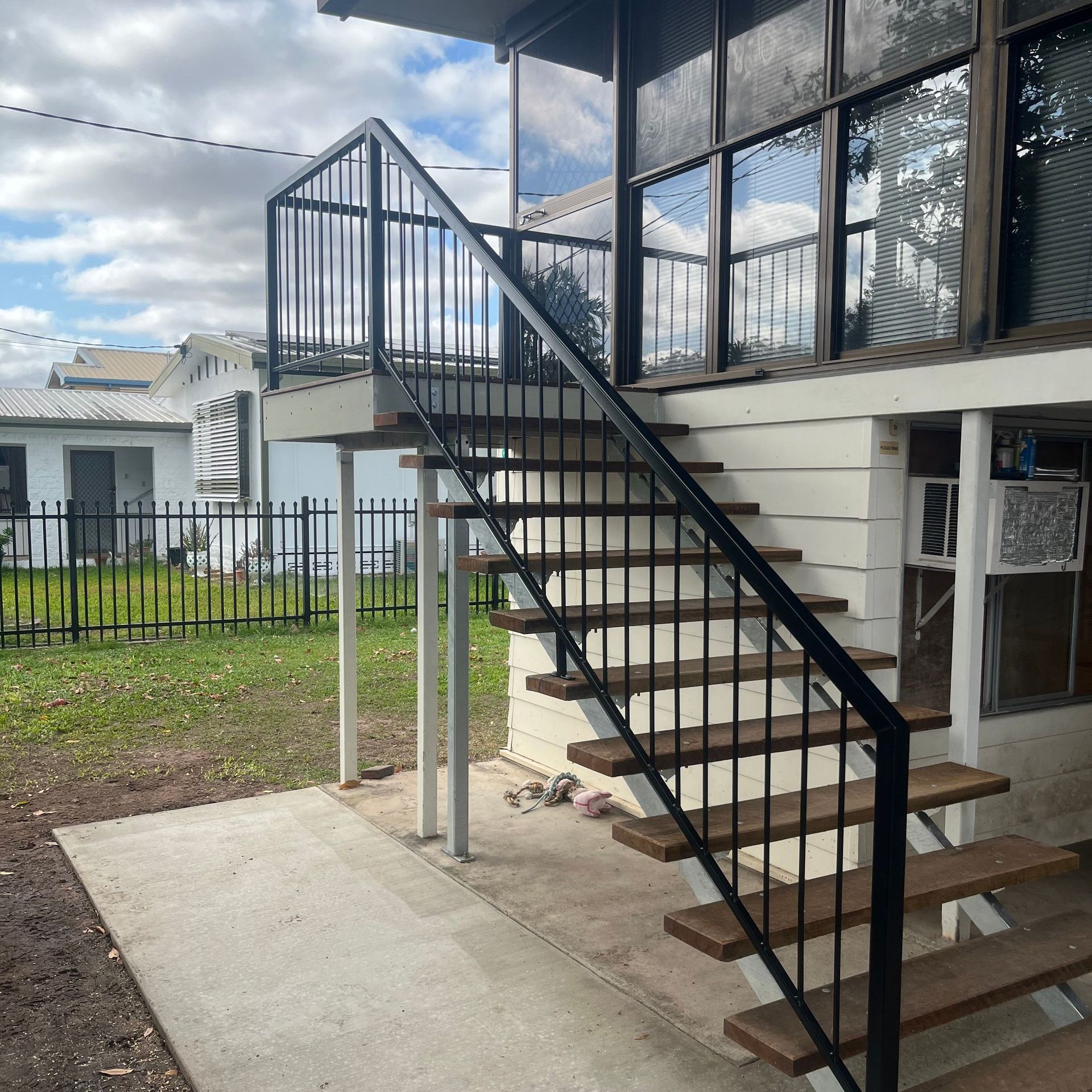 A Staircase Is Being Built Into A Wall In A Building Under Construction — Quality Fabrications & Welding Pty Ltd In Bohle, QLD