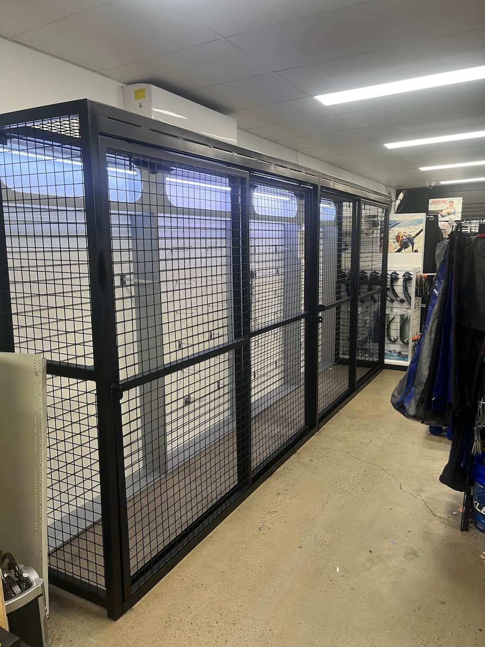 A Room With A Lot Of Cages In It — Quality Fabrications & Welding Pty Ltd In Bohle, QLD