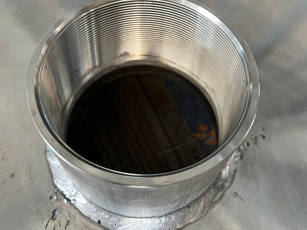 A Metal Bowl With A Hole In The Middle Of It Filled With Liquid — Quality Fabrications & Welding Pty Ltd In Bohle, QLD