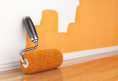 Orange paint on the wall done with roller brush in Grantham, NG