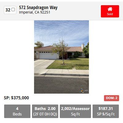 Real estate listing for 572 Snapdragon Way: a house with 4 beds, 2 baths, and a sold price of $375,000.
