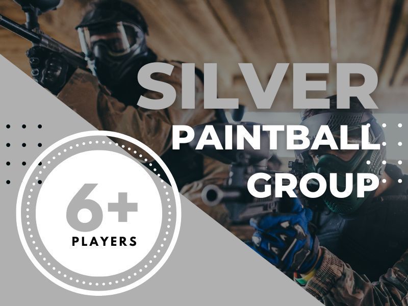 A group of people are playing paintball in a silver paintball group.