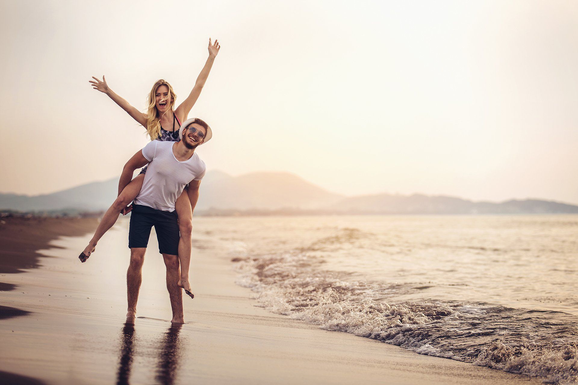 Happy couple on the beach