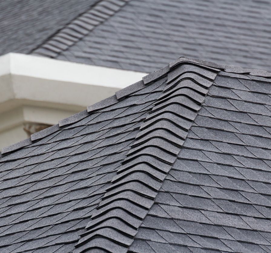 The roof of a house has been damaged by a hurricane.
