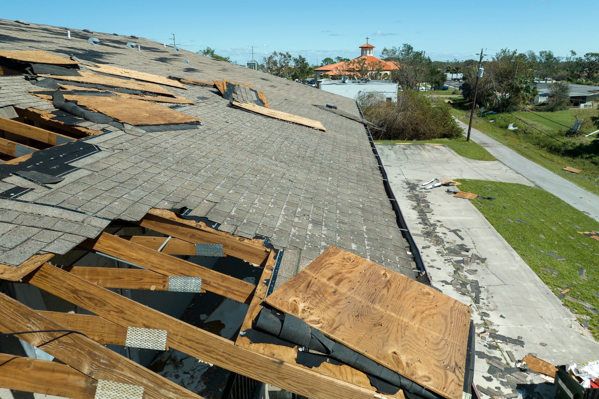 The roof of a house has been damaged by a hurricane.
