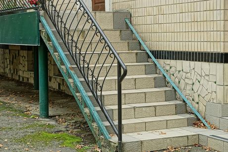 concrete stairs with handrails