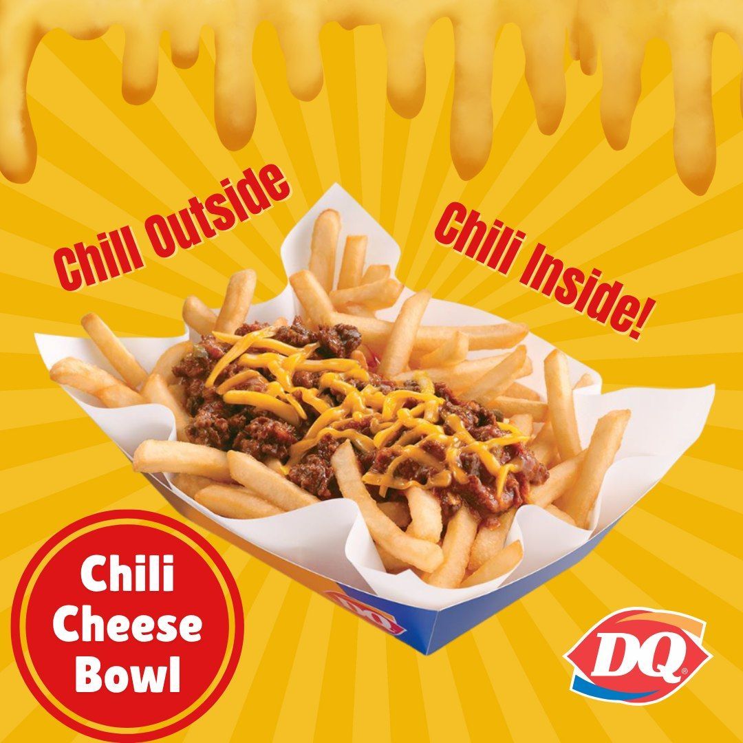 A man is holding his fist up in the air with a buckley coupon in front of him