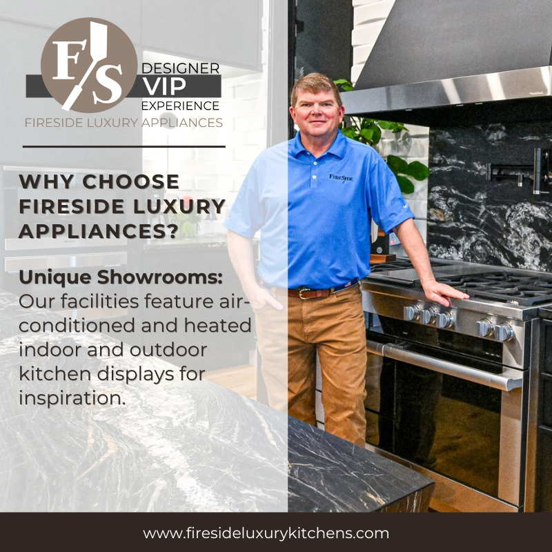 A man in a blue shirt is standing in front of a stove