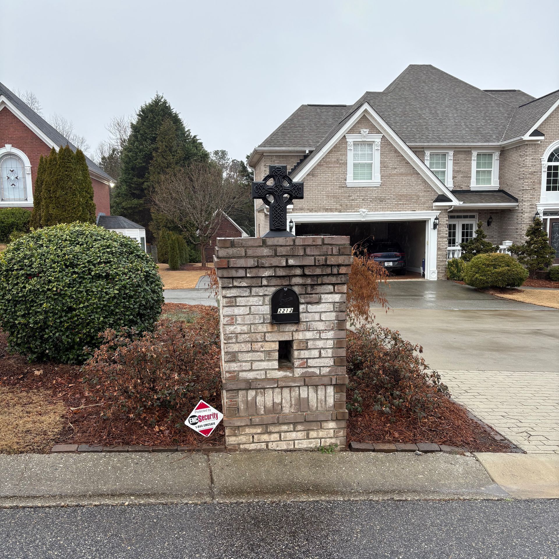 A house with a mailbox in front of it