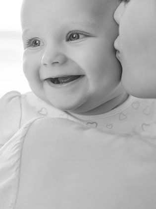 Smiling baby - Law Firm in Denver, CO