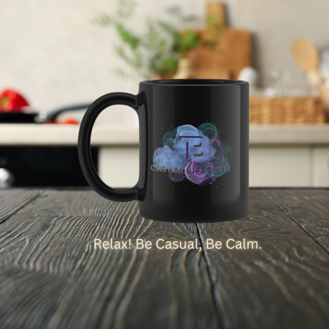 A black coffee mug is sitting on a wooden table.