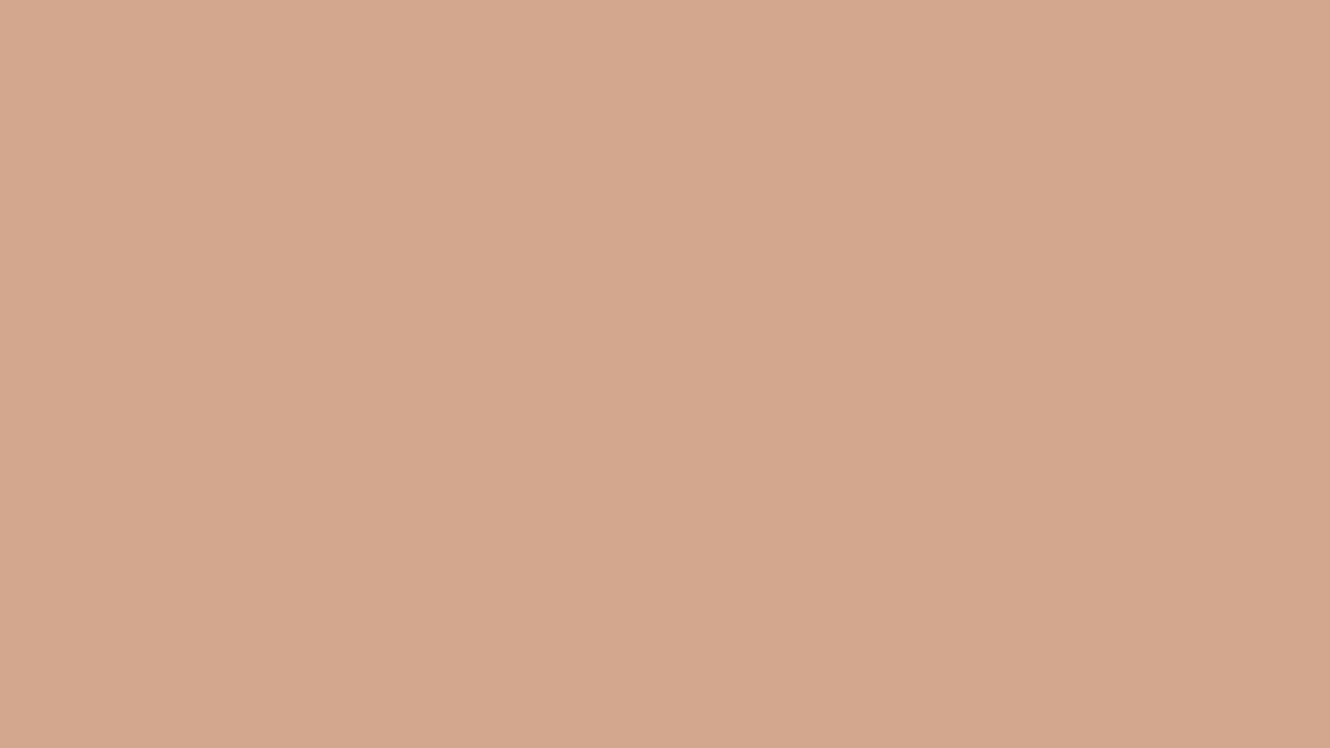 A close up of a plain beige background.
