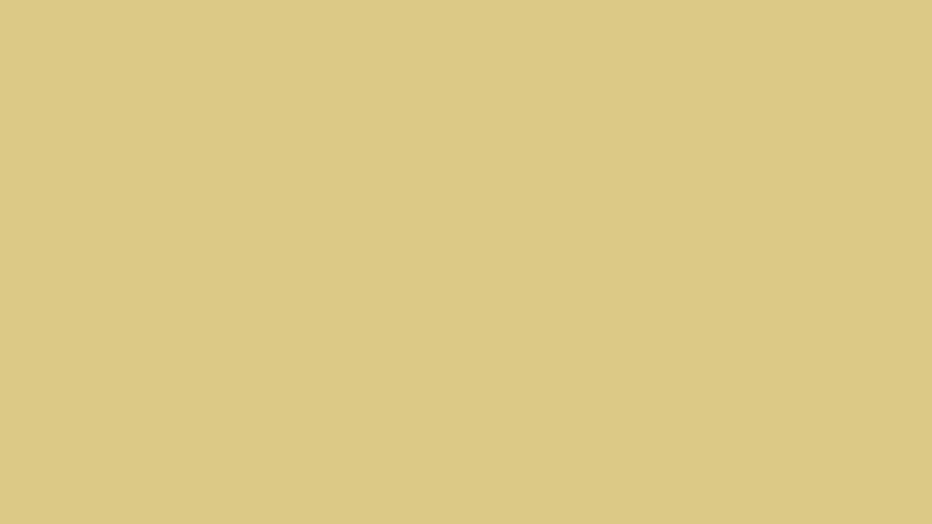A close up of a yellow background with a plain texture.