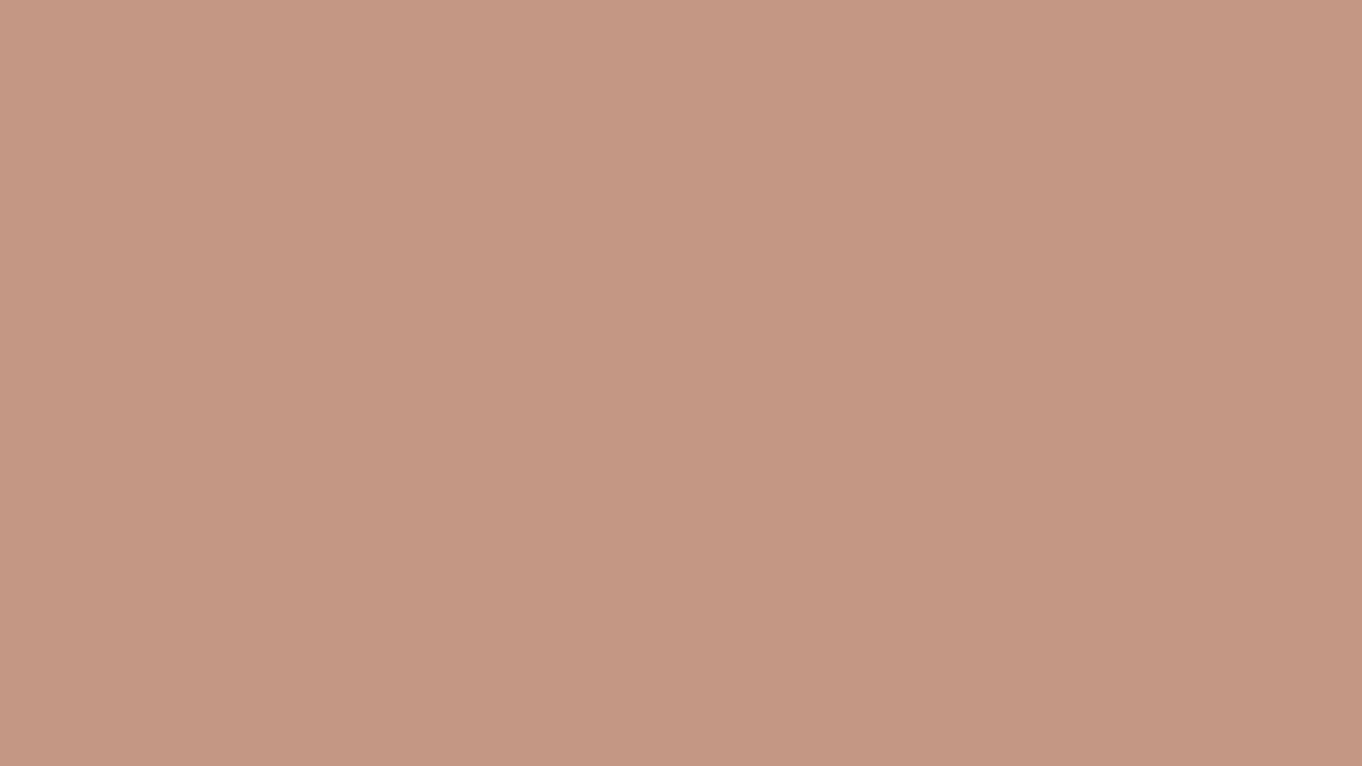 A close up of a pink background with a plain texture.