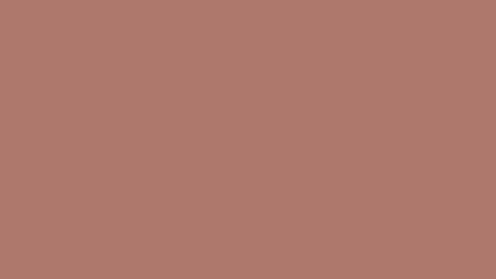 A close up of a pink background with a plain texture.