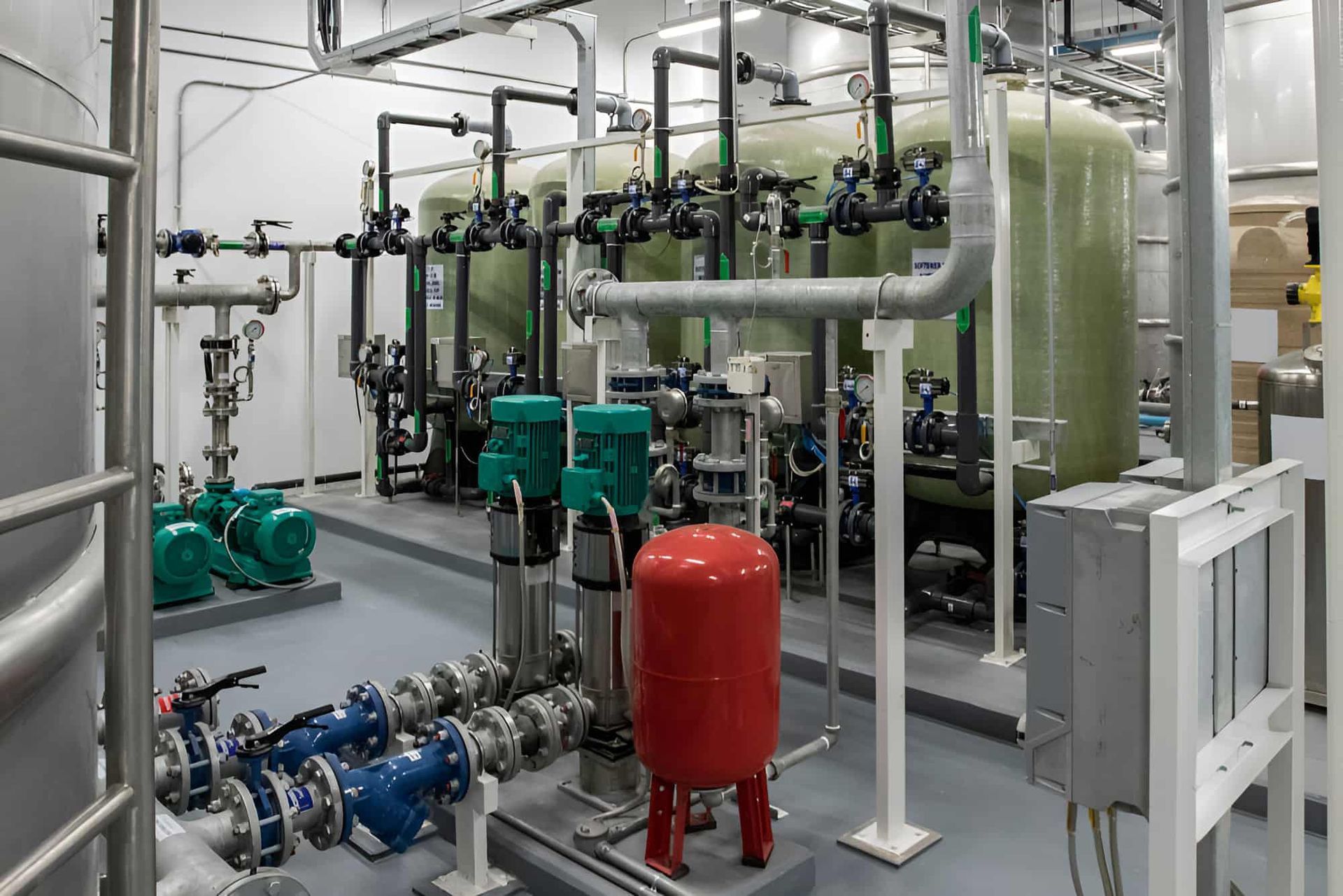 A Large Room Filled With Lots Of Pipes And Pumps — Gillen Plumbing In Ciccone, NT