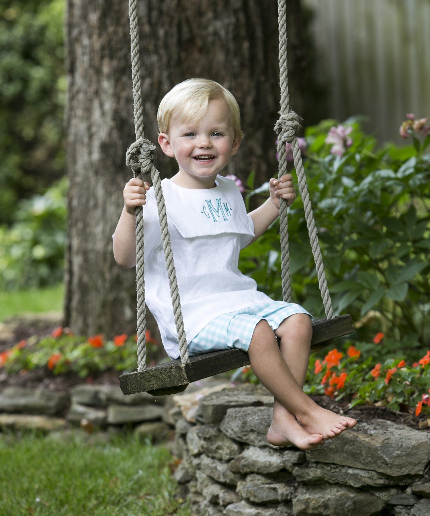 Outdoor picture of boy swinging in Nashville